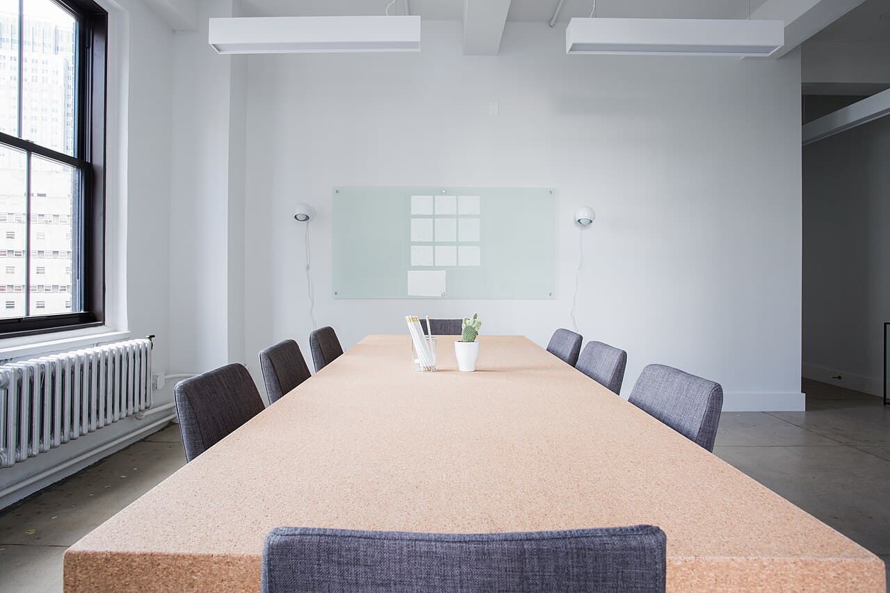 An empty meeting room for college-level presentations and career preparation